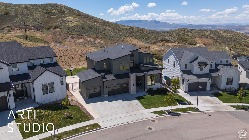 Aerial view featuring a residential view and a mountain view