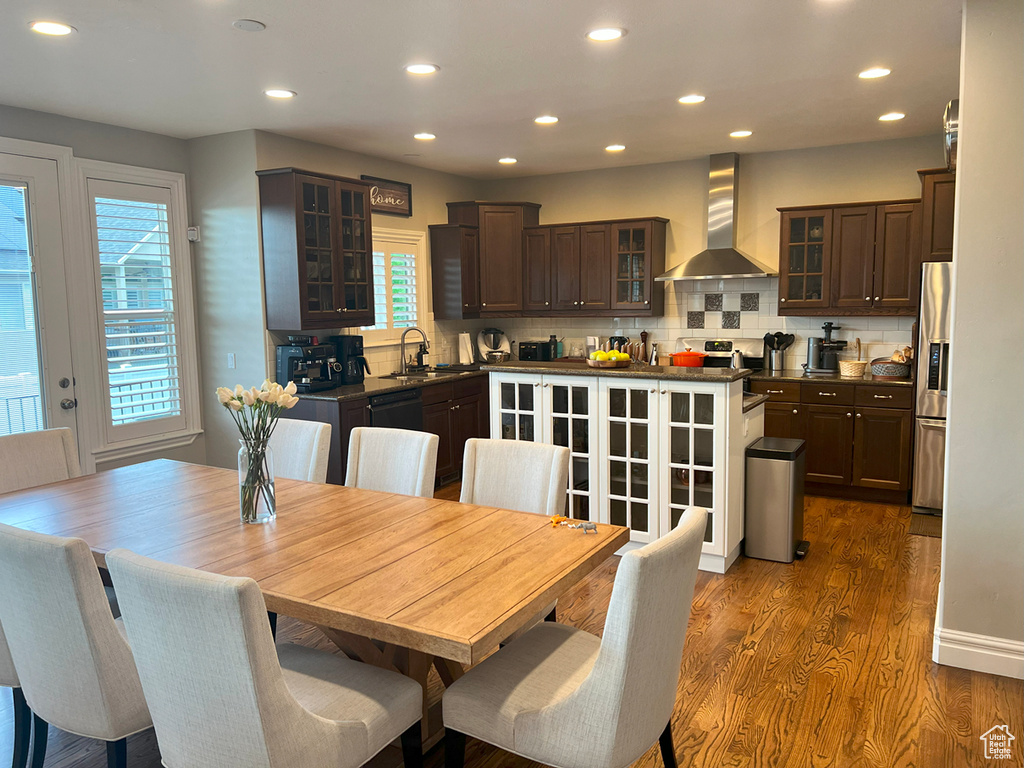 Dining area featuring recessed lighting and dark wood finished floors