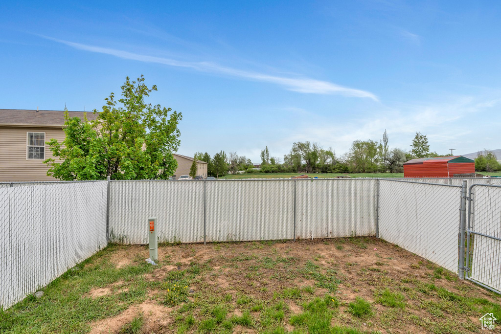 View of yard with fence