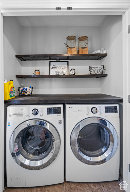 Clothes washing area with washing machine and clothes dryer