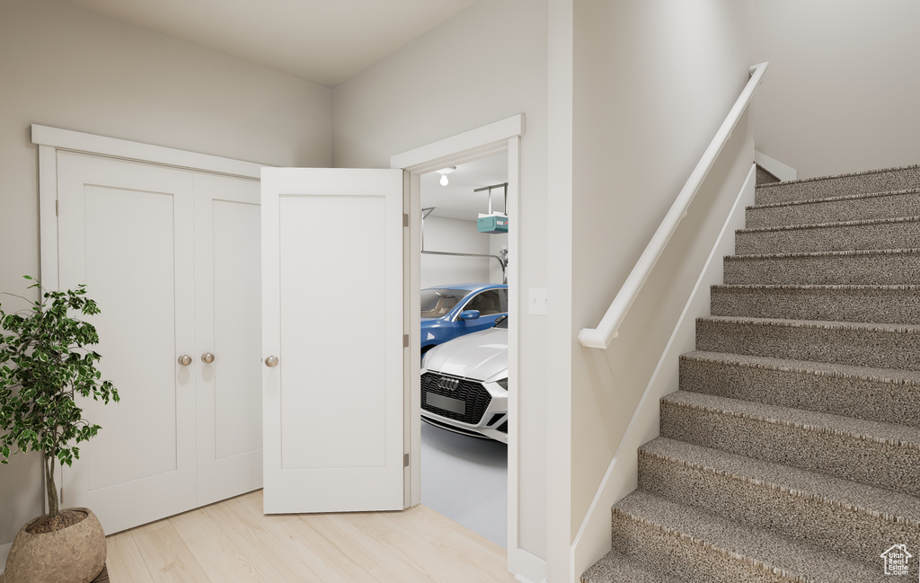 Staircase with wood finished floors