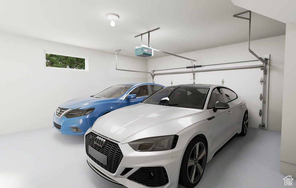 Garage featuring a garage door opener