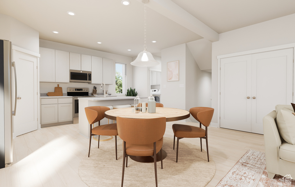 Dining space featuring recessed lighting and light wood-style flooring