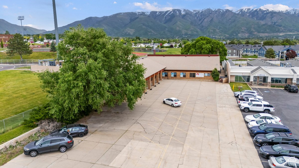 View of mountain background featuring nearby suburban area