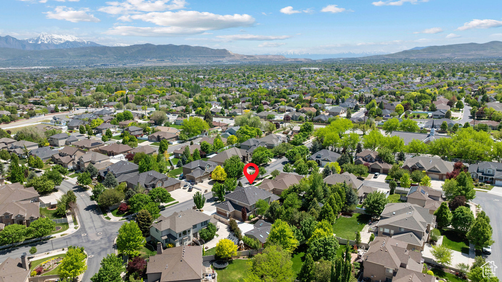 Aerial perspective of suburban area with mountains