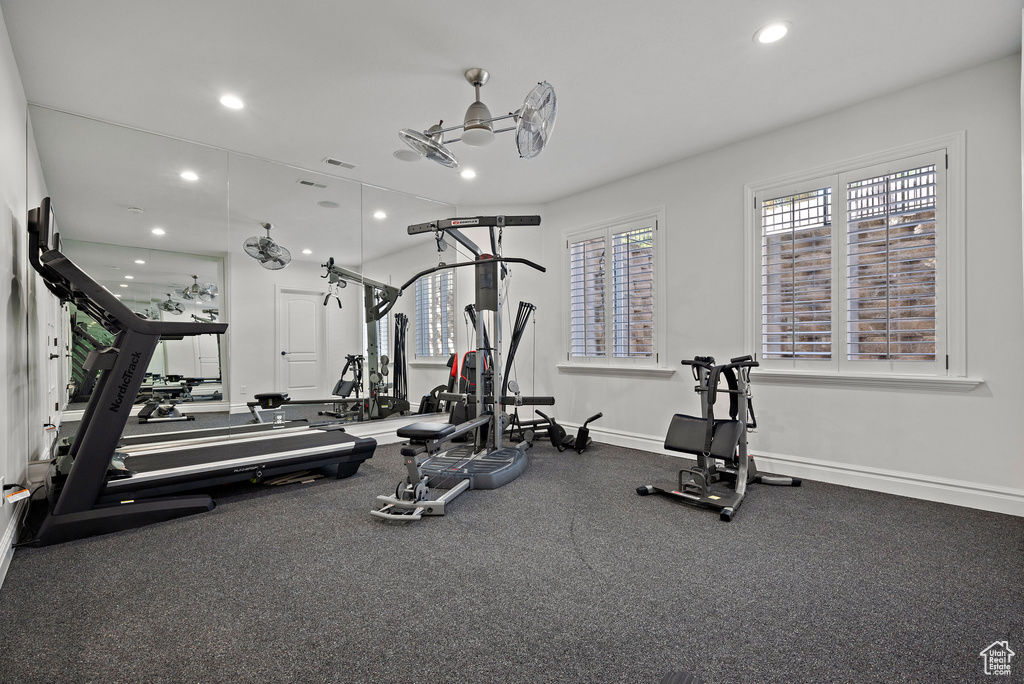 Gym featuring recessed lighting and baseboards