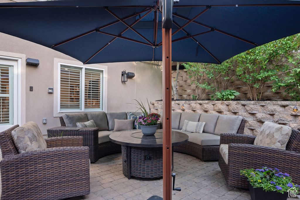 View of patio with an outdoor living space