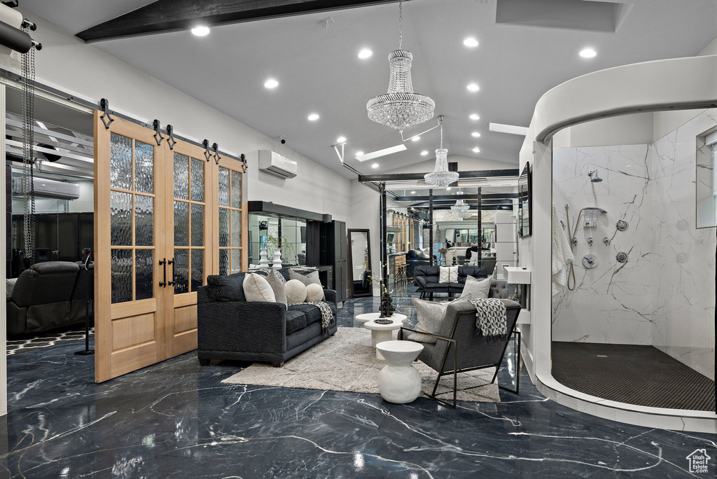 Community lobby with lofted ceiling and recessed lighting
