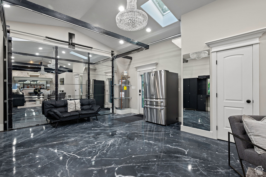 Common area featuring lofted ceiling and recessed lighting