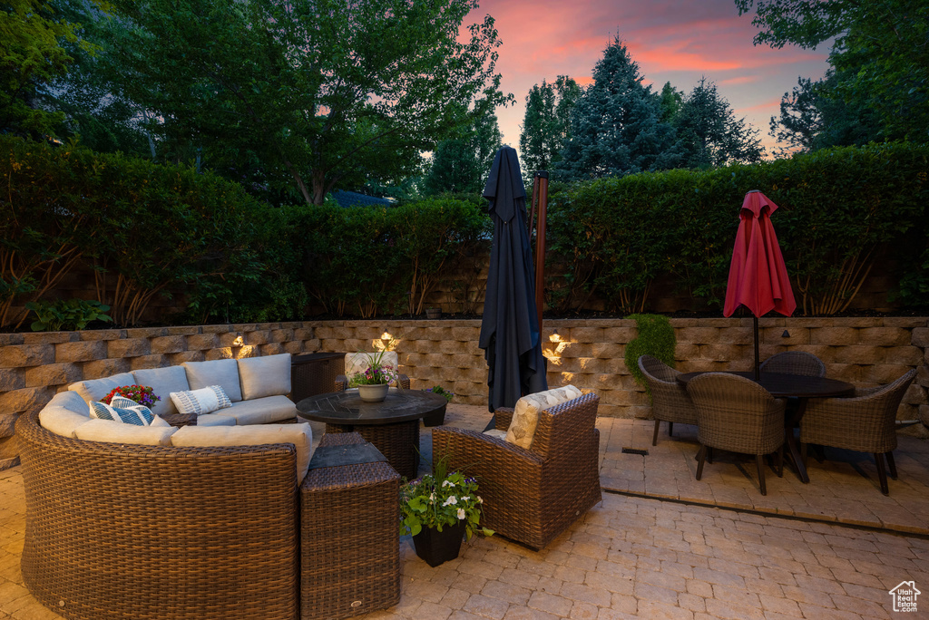 View of patio / terrace featuring outdoor dining space and an outdoor hangout area