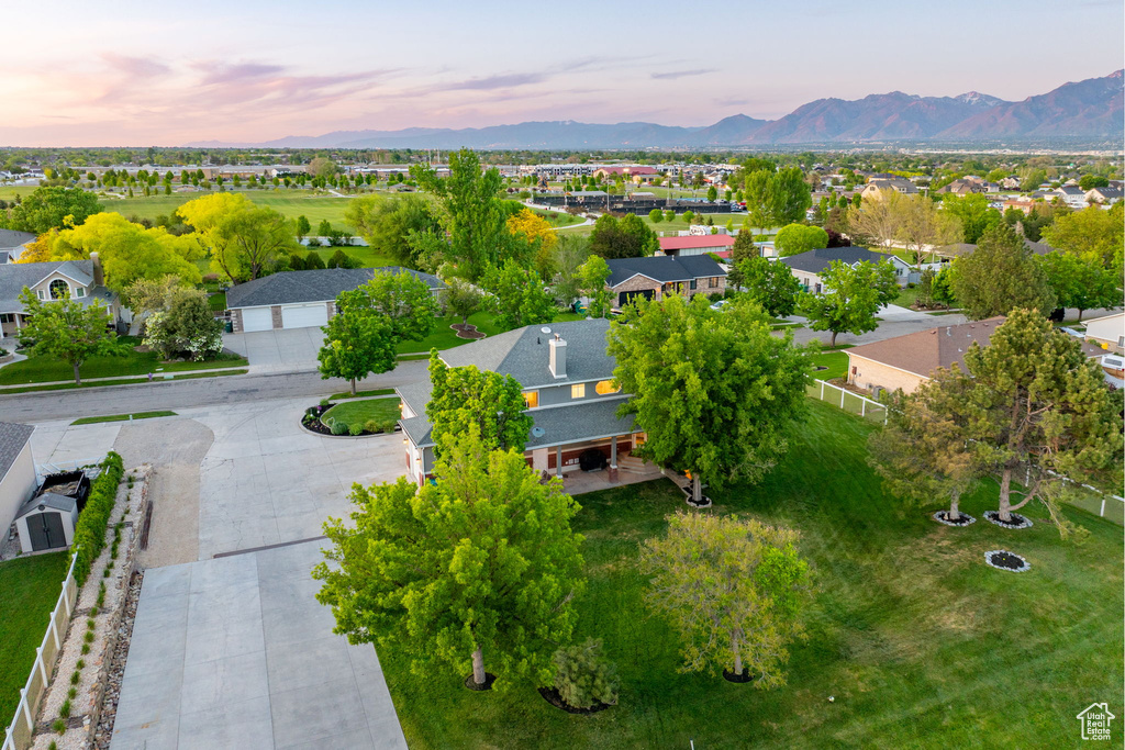 Aerial view of residential area with a mountainous background