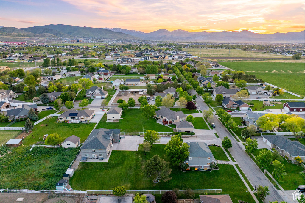 Aerial view at dusk of a mountain view and a residential view
