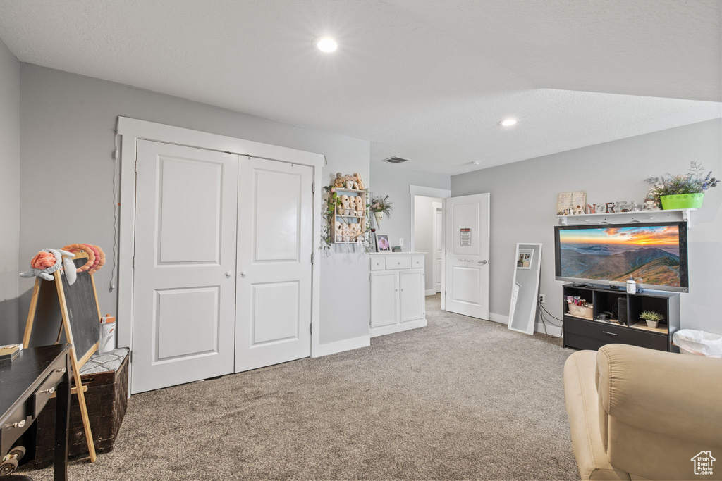Rec room with carpet floors, recessed lighting, and baseboards