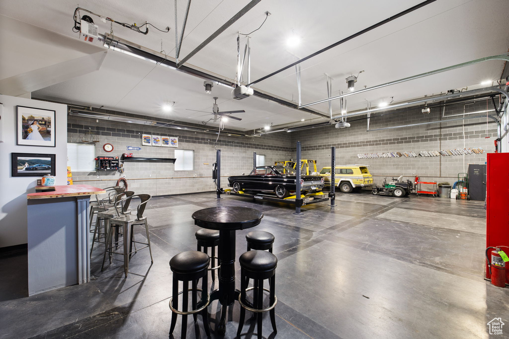 Garage featuring a garage door opener