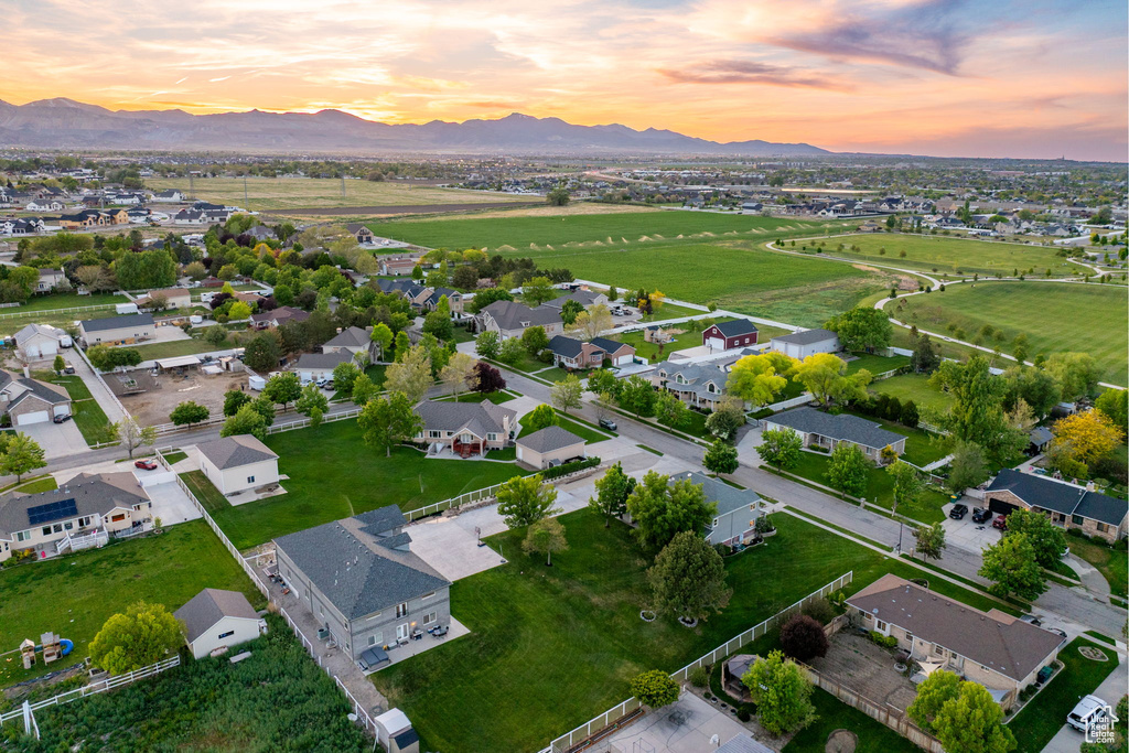 Aerial view at dusk of a mountain view and a residential view