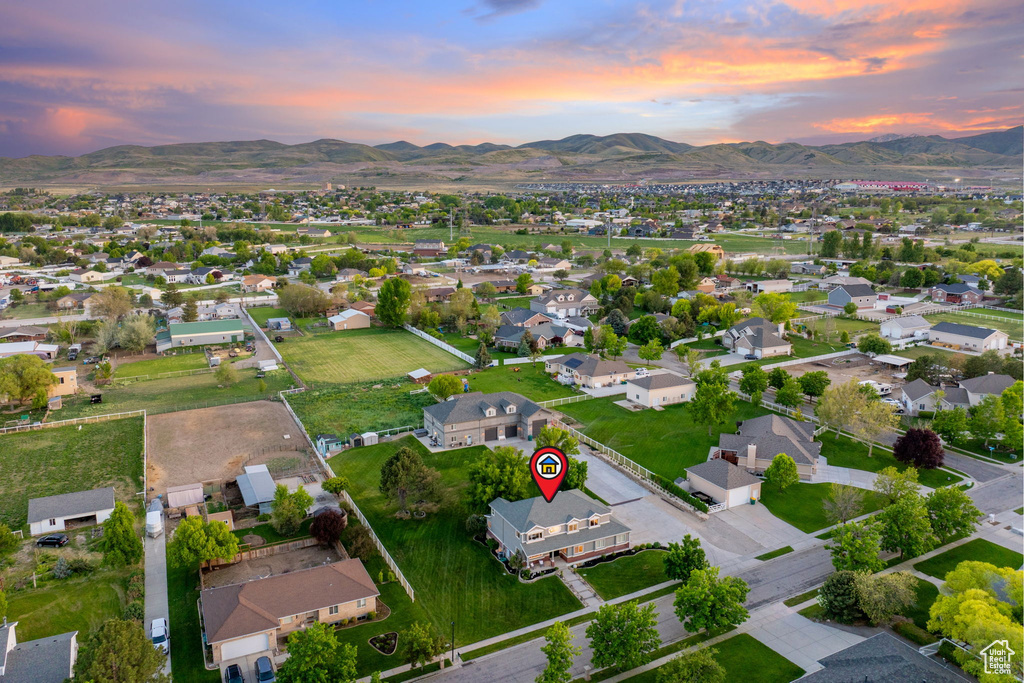 Aerial view at dusk of a mountain view and a residential view