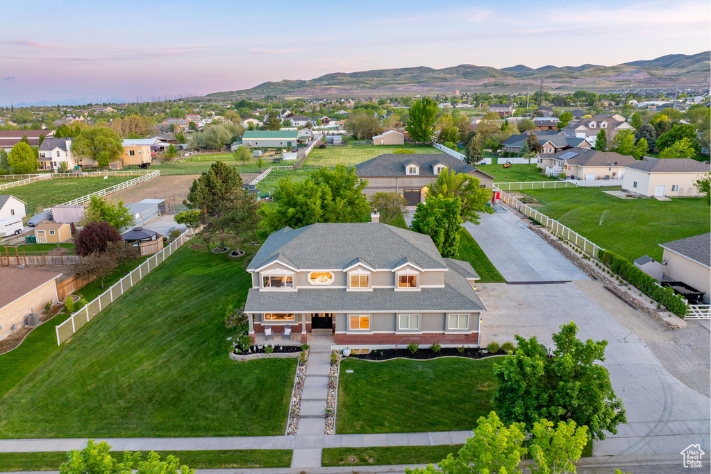 Aerial view of residential area with a mountainous background