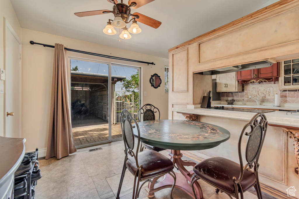 Dining area with a ceiling fan