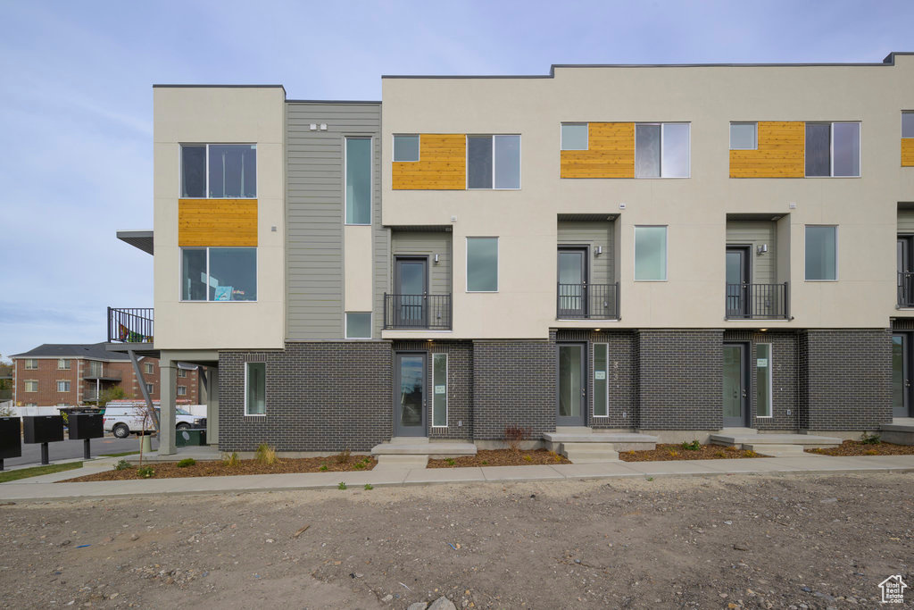 View of front of home with stucco siding