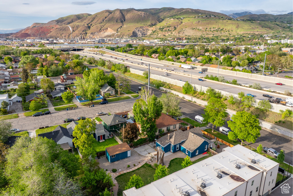Aerial view of residential area with a mountain backdrop