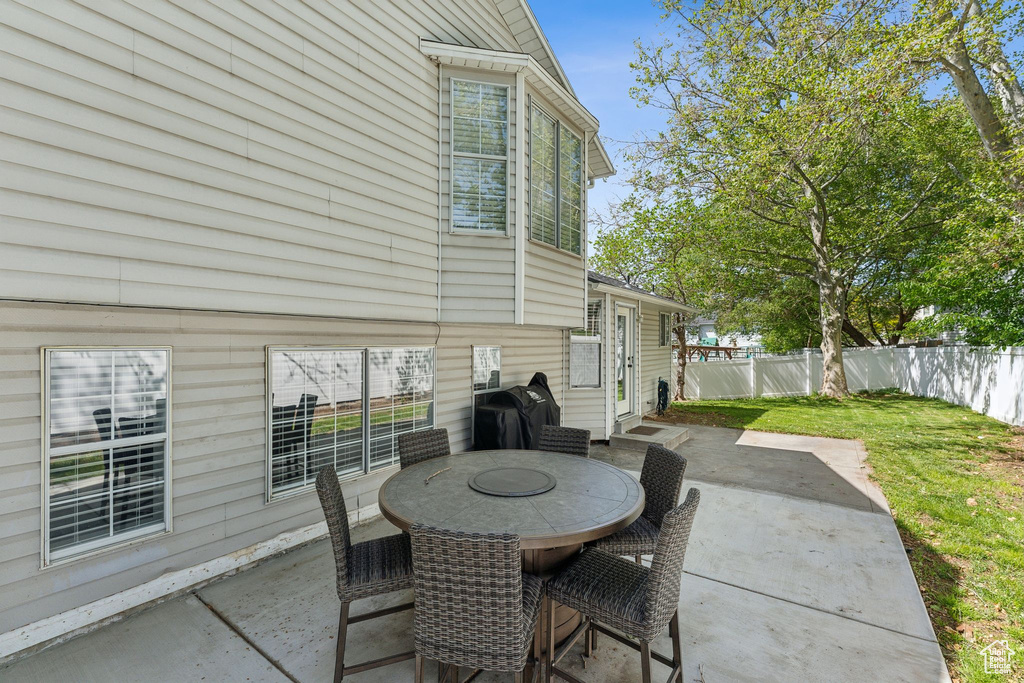 View of patio / terrace featuring grilling area and outdoor dining space