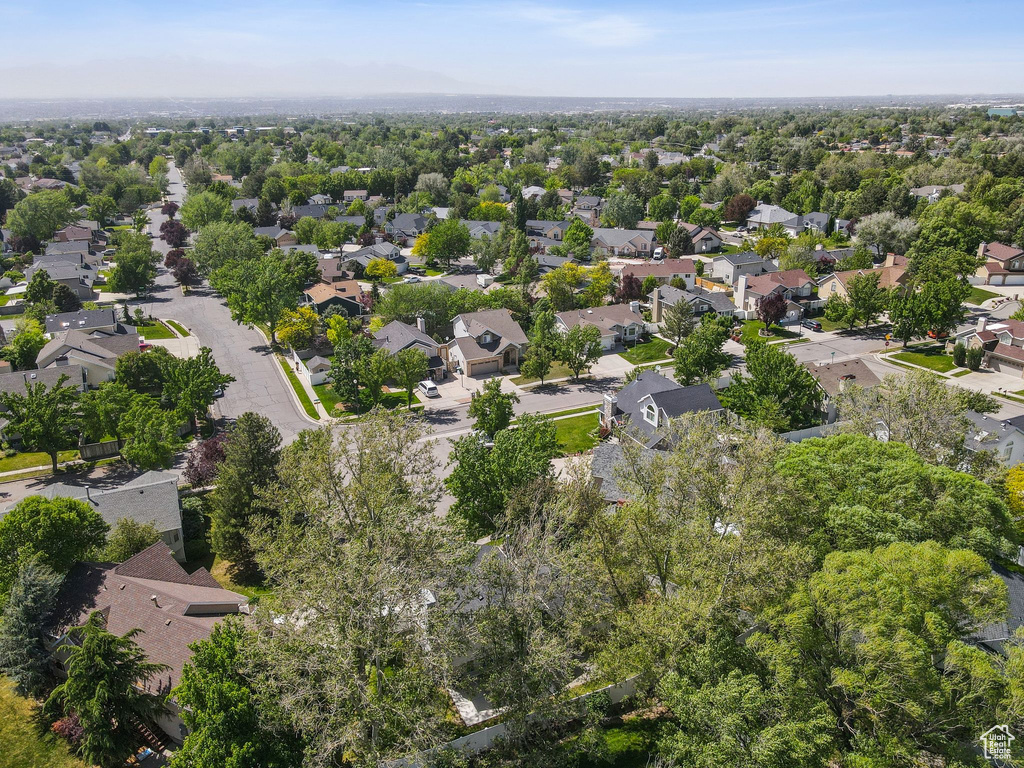 Aerial overview of property's location with nearby suburban area