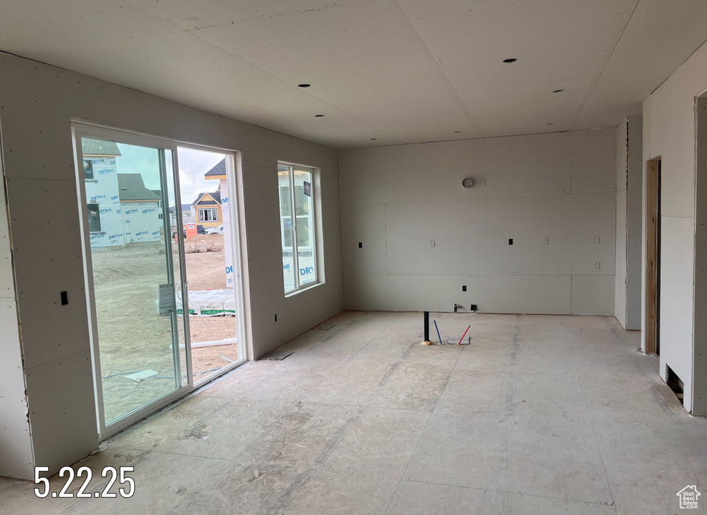 Unfurnished room with plenty of natural light