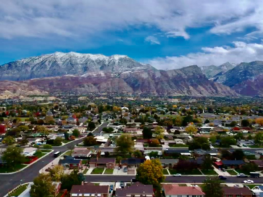 Aerial view of residential area with a mountain backdrop