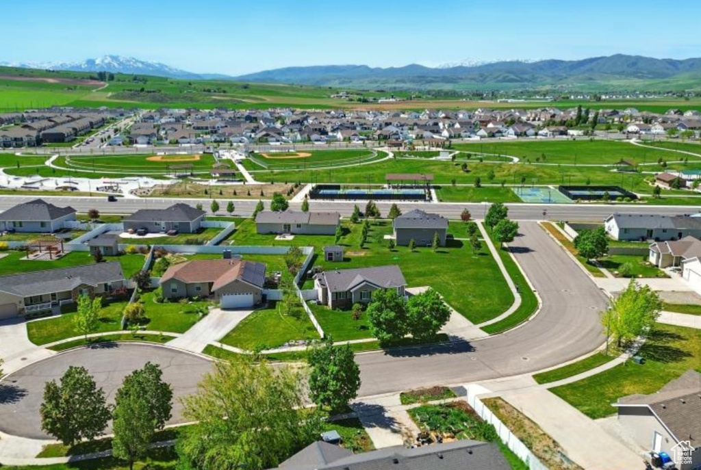 Aerial view of residential area with a mountainous background