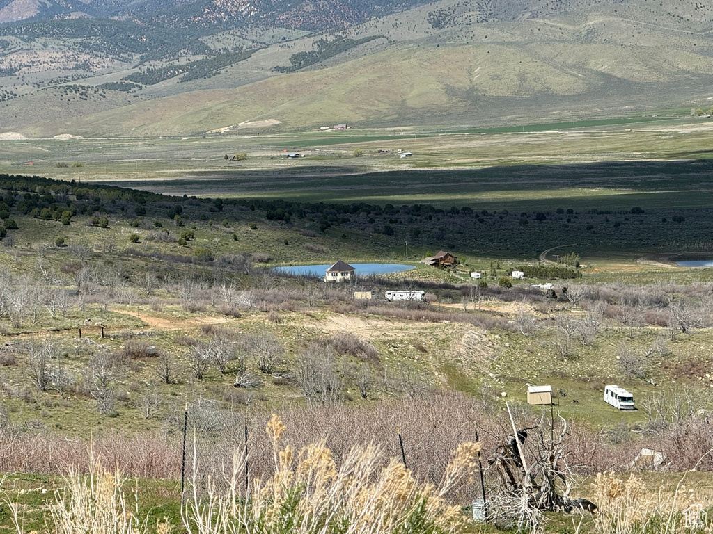Mountain view featuring rural landscape and a large body of water