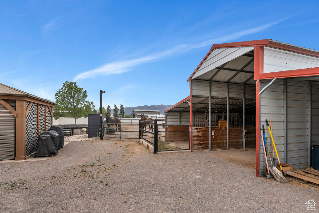 Stable featuring a mountain view
