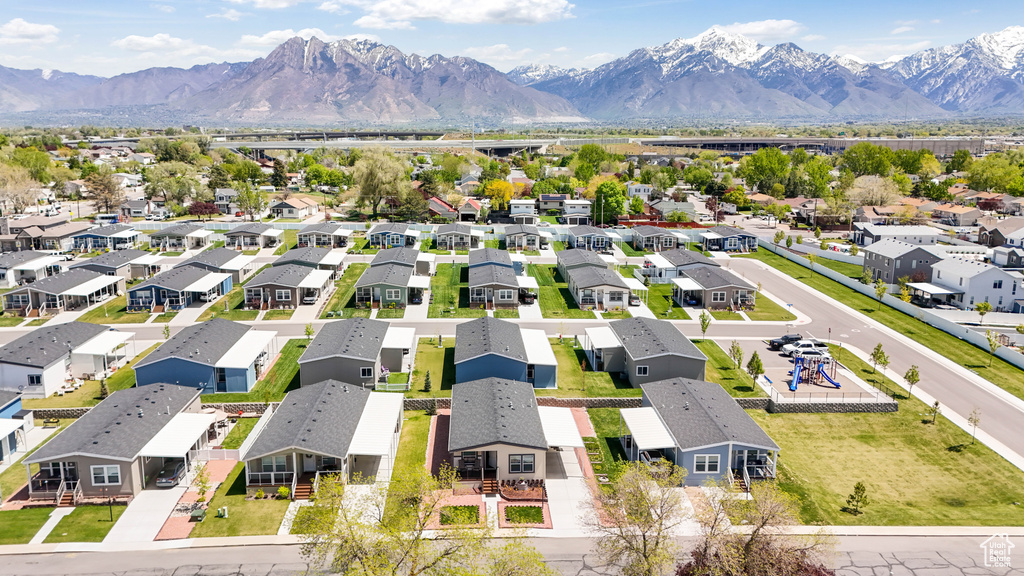 Aerial view of residential area with a mountain backdrop