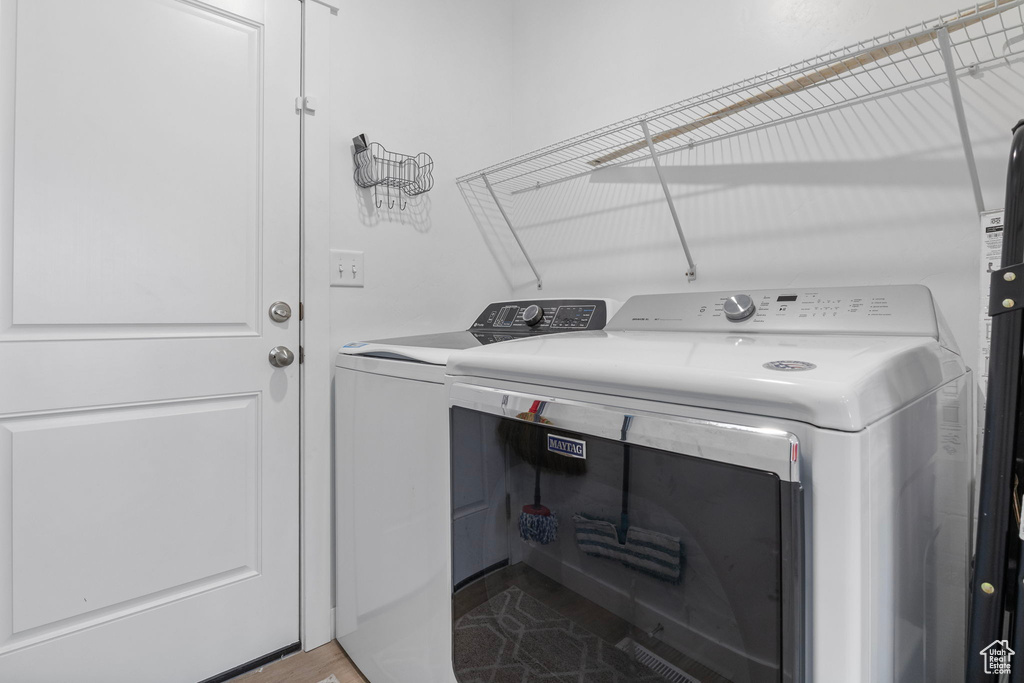 Clothes washing area with separate washer and dryer