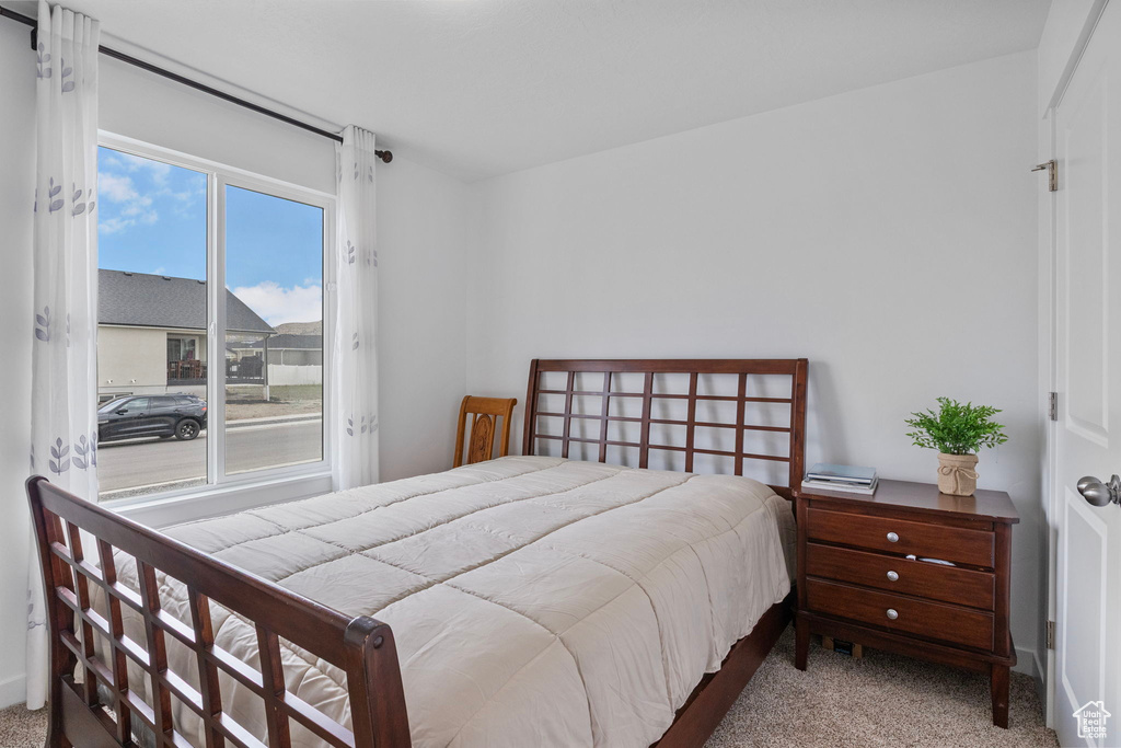 Bedroom featuring carpet flooring