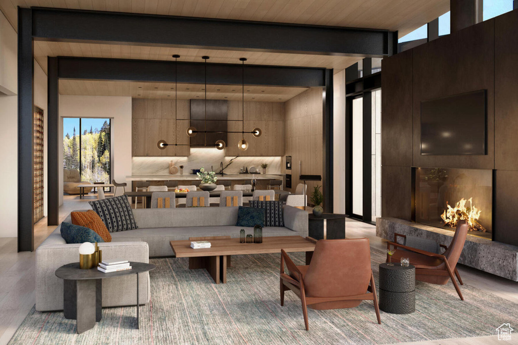 Living area featuring beam ceiling