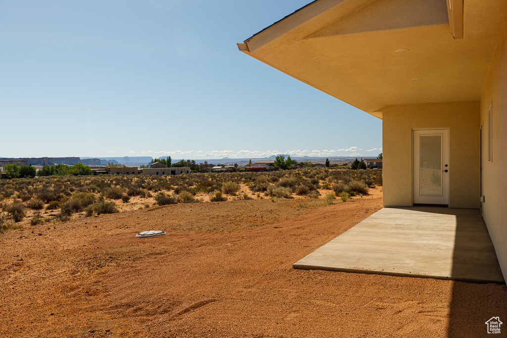 View of yard with a patio area and a mountain view