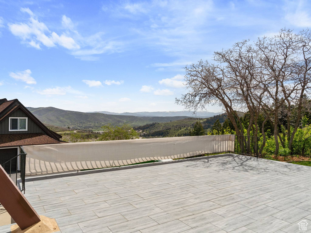 View of patio with a mountain view
