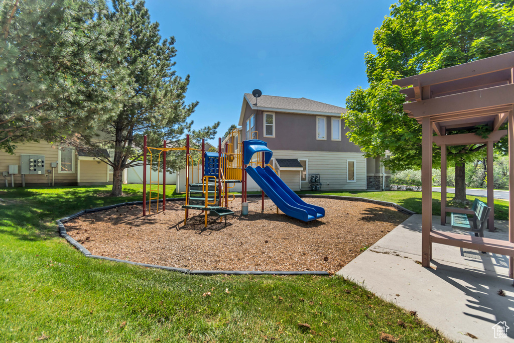 Community playground with a yard