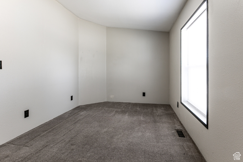 Empty room featuring carpet