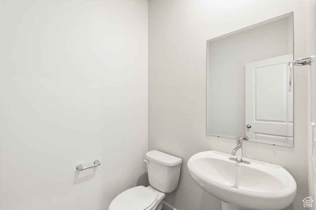 Bathroom with a sink and toilet
