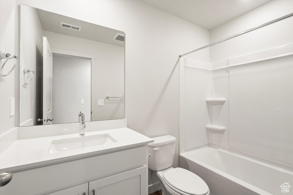 Full bathroom with vanity and shower / tub combination