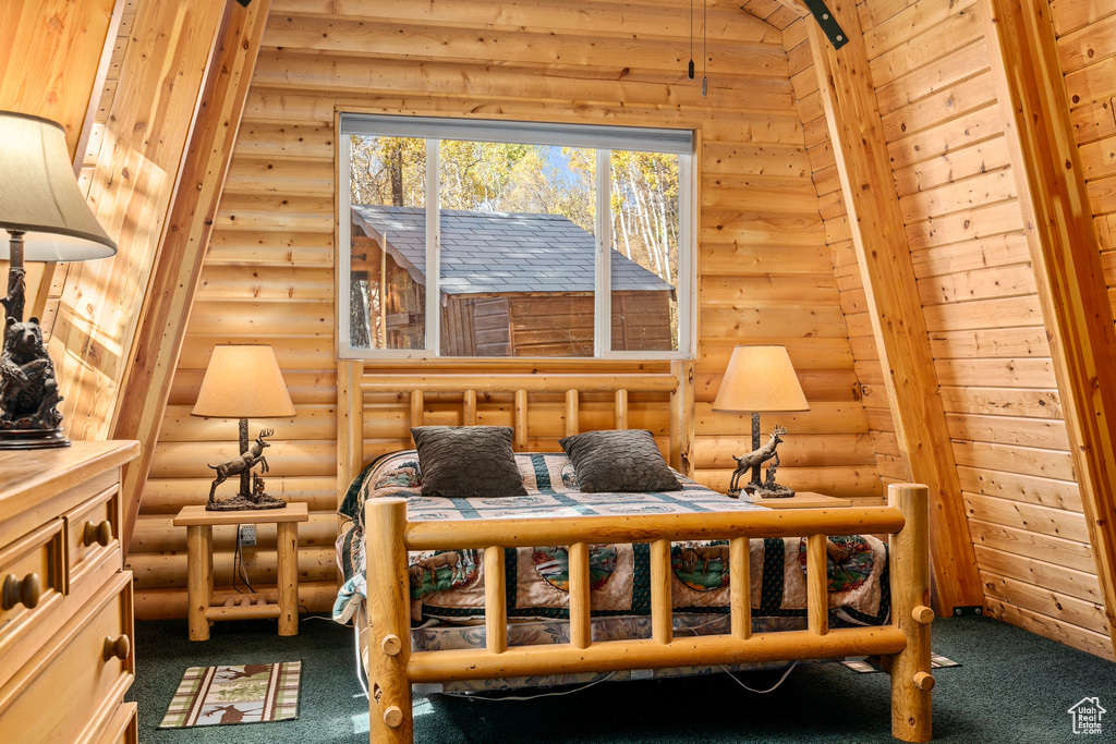 Sitting room with rustic walls and carpet
