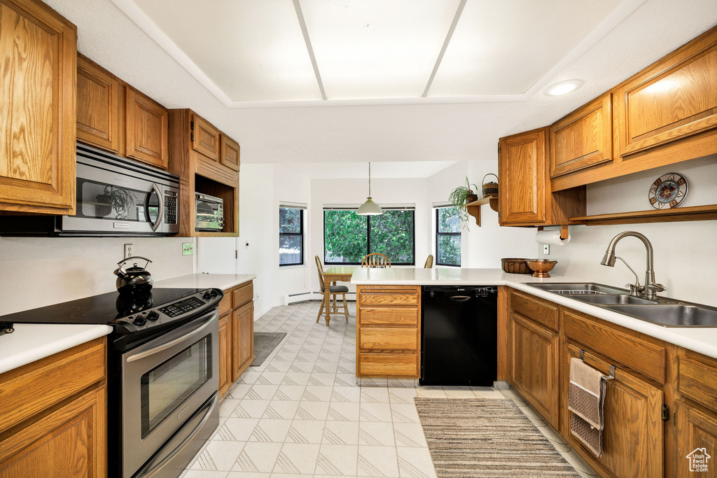 Kitchen with stainless steel appliances, a sink, open shelves, and brown cabinets