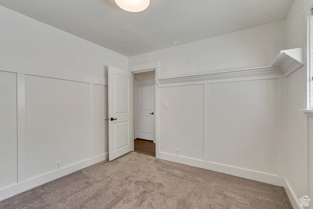 Bonus room with light carpet