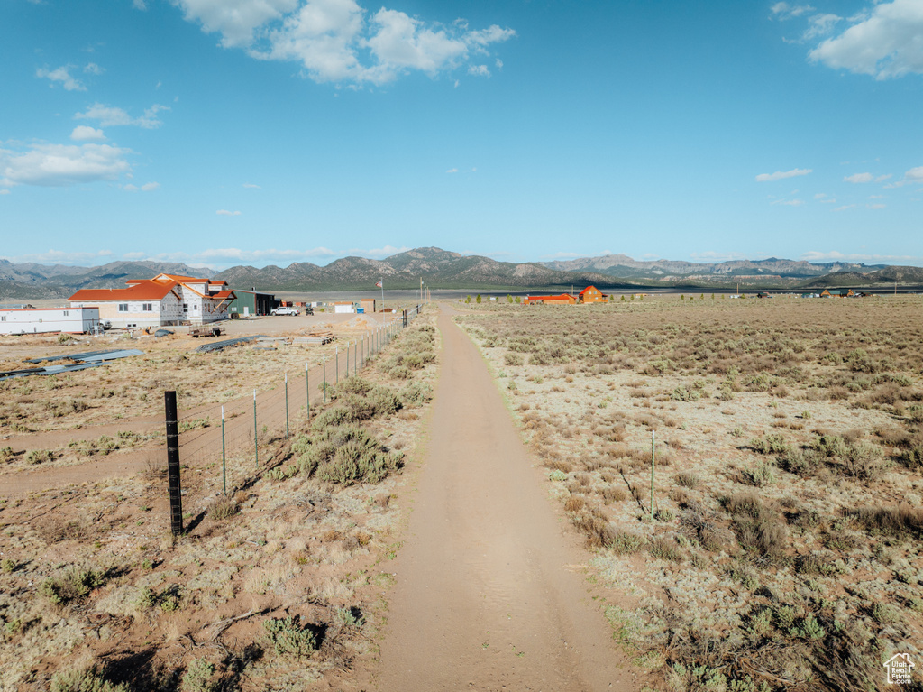 View of mountain backdrop featuring rural landscape