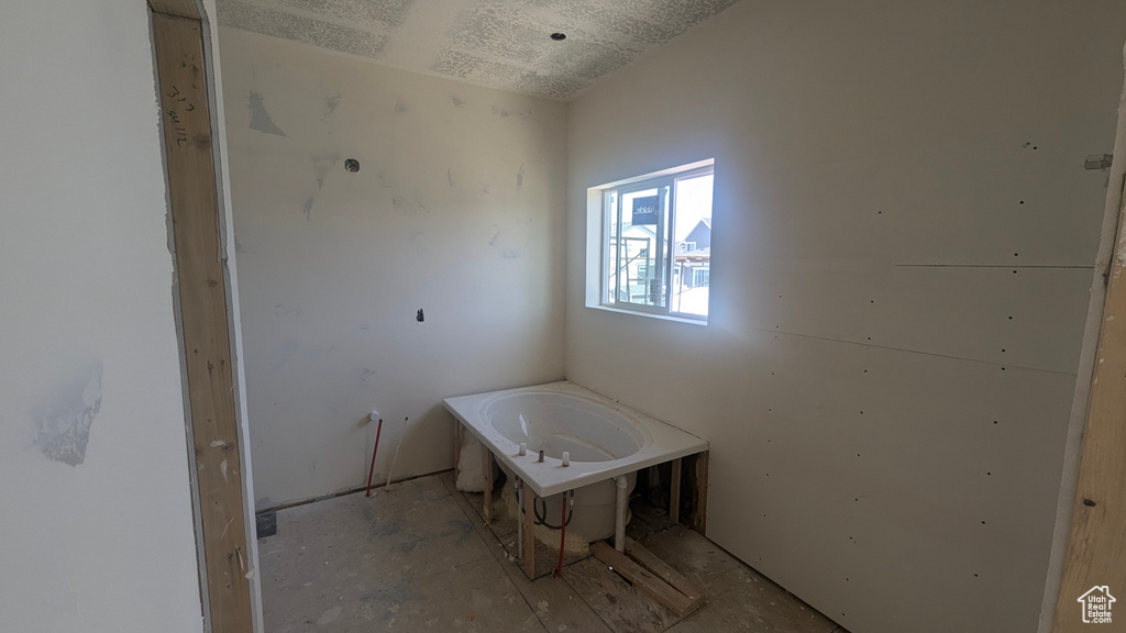 Full bathroom with a tub
