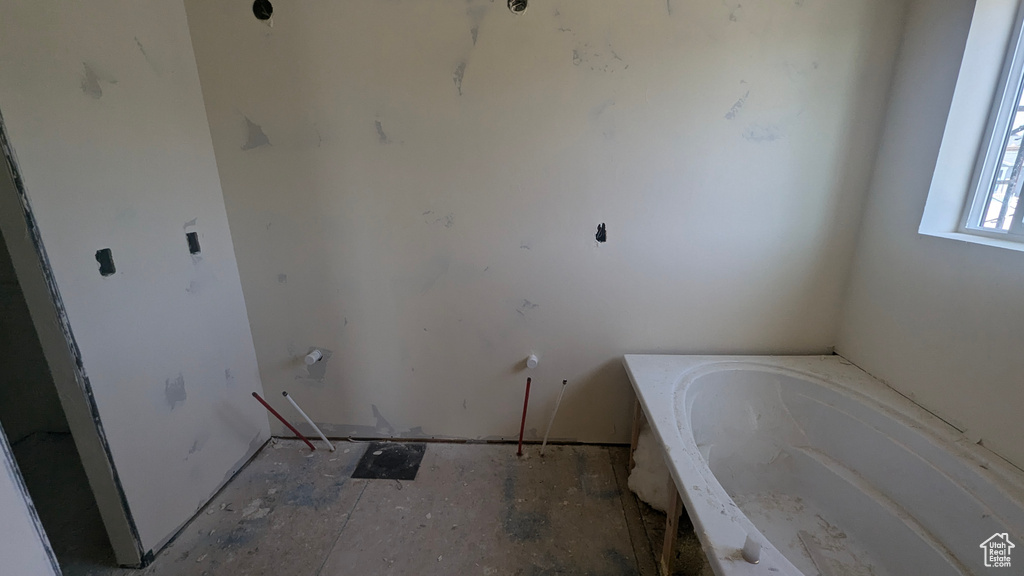 Full bathroom with a garden tub