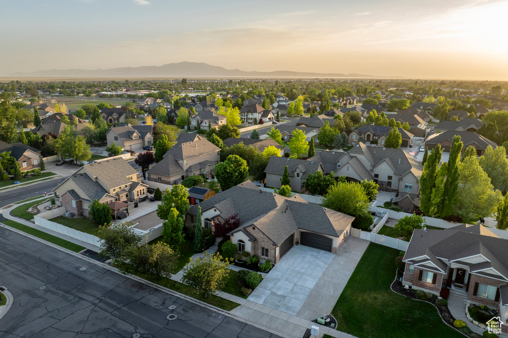 Aerial view at dusk of a residential view and a mountain view