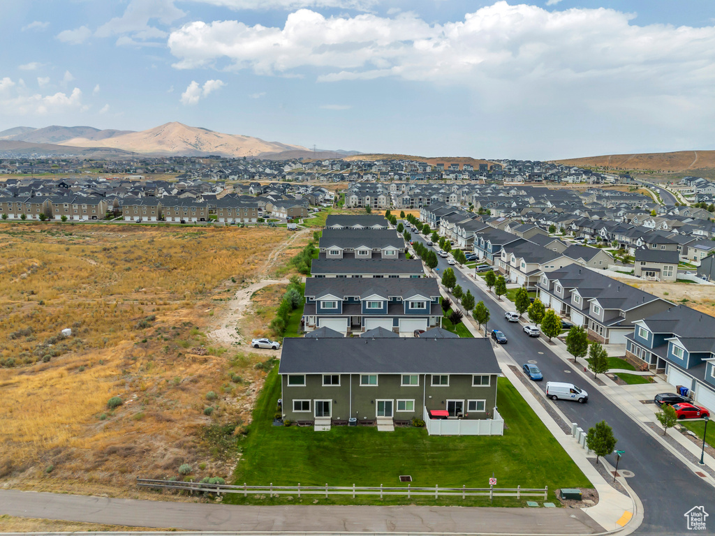 Aerial view of residential area with a mountain backdrop