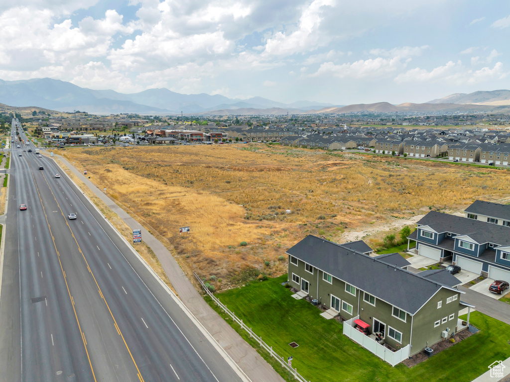Aerial view of residential area with a mountainous background